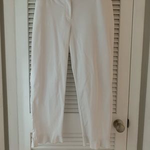 Lane Bryant white pants with cuff ruffle.